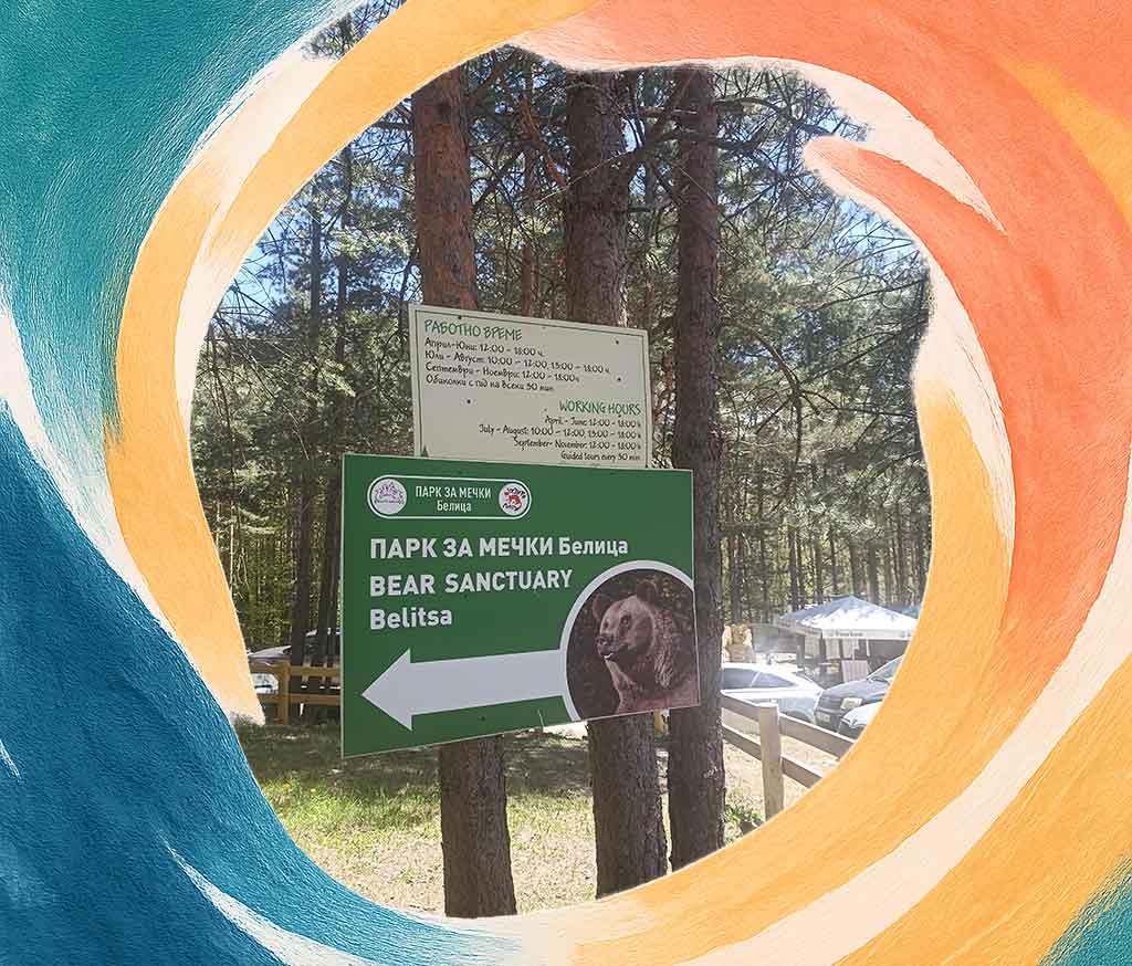 Welcome sign showing the working hours for the Belitsa Bear Park in Bulgaria