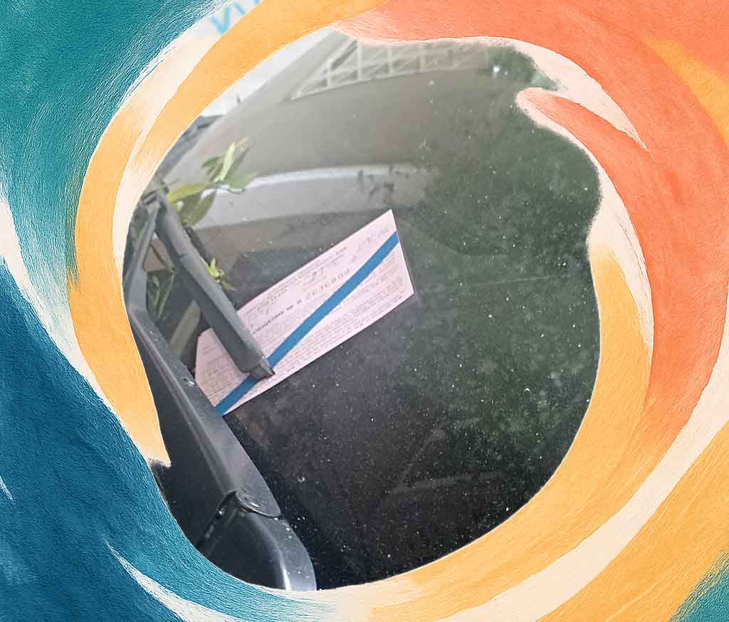 Sofia parking fine payment notice for violating Sofia parking rules, placed on a car windshield by Sofia traffic control.